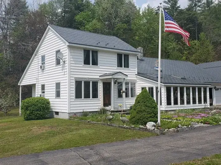 Charcoal Grey Interlock aluminum shingle roof in Gilsum, NH — installed 2004